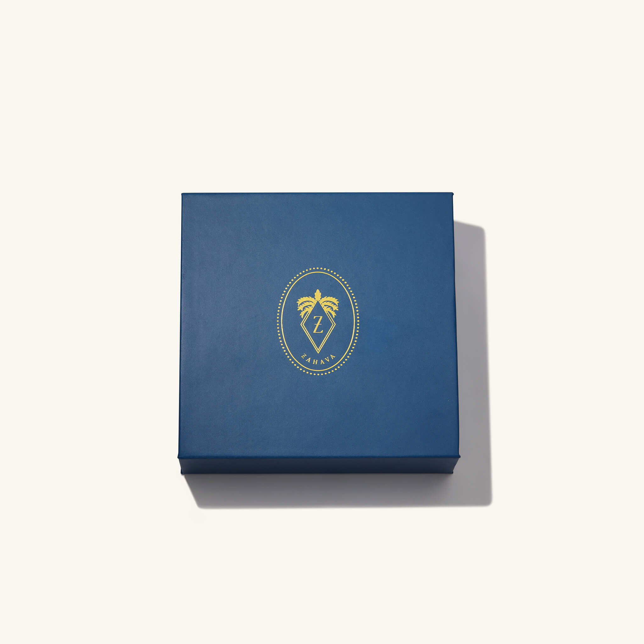 Blue Zahava Shipping Box with Gold logo
