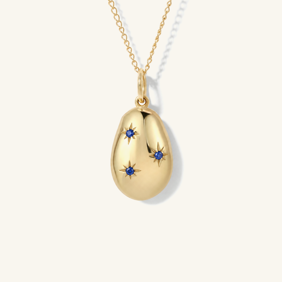 Sapphire Carob Bean High Polish Pendant