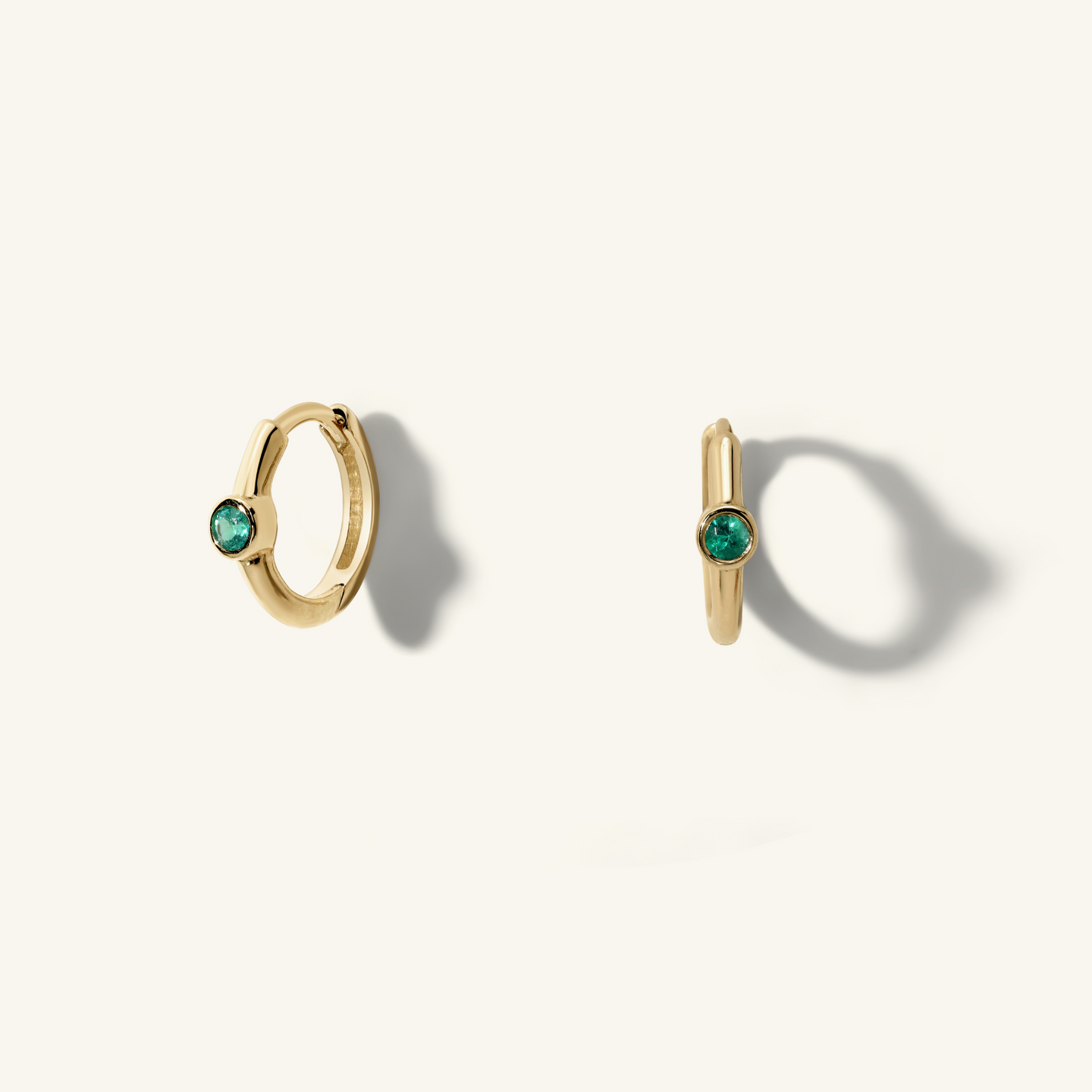 Romy Emerald Huggie Hoop Earrings